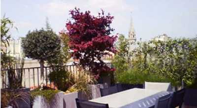Aménagement paysager d'une terrasse avec vue à Quimper