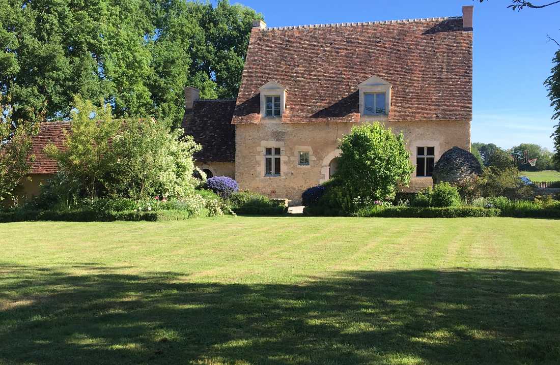 Maison ancienne au coeur d'un vaste jardin