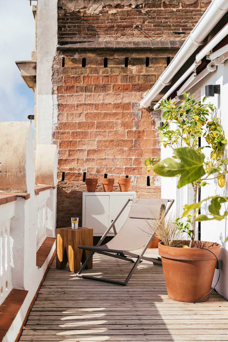 Aménagement d'un espace de vie à l'extérieur -  terrasse côté balcon