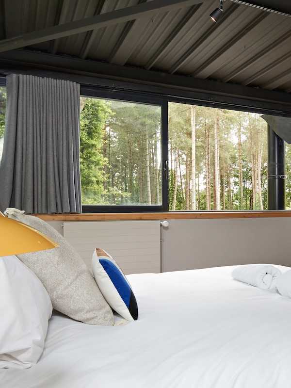 Aménagement d'un hôtel 4 étoiles ecolodge - chambre avec vue extérieure